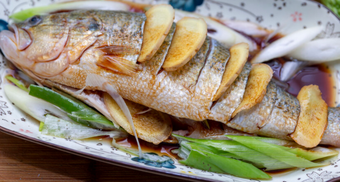 How long should sea bass be steamed?